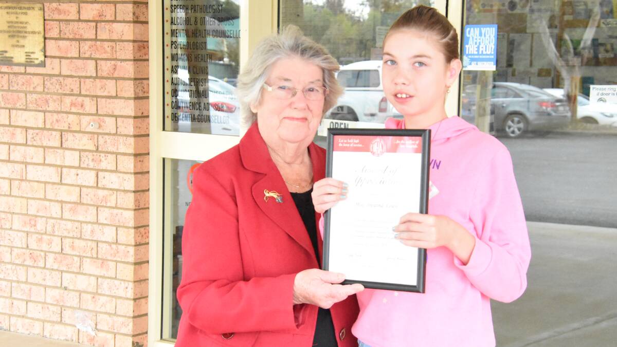 President of the Canowindra Hospital Auxiliary Peggy Beath with Breanna Lewis who raised $150 for the town's Hospital Auxiliary. 