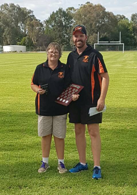 Leanne Stevenson has been made a life member of the Canowindra Little Atheltics Club. She's pictured with Canowindra Athletic Club's Andrew Phelan.