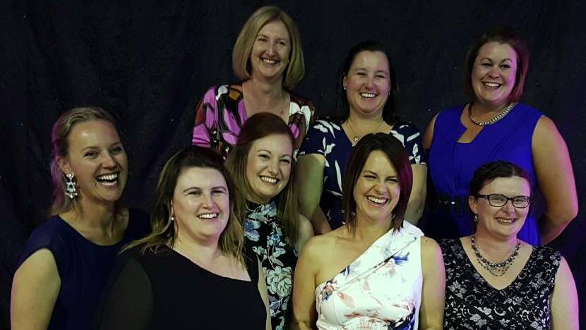 The team from Yates Baker McLean celebrate their 2016 Daroo Business Award: Lisa Fraser, Karen Bollinger, Tracie Milne, Cally Woodhouse, Nicola Brazier, Belinda Thurtell, Abby Sands and Elise Heath.