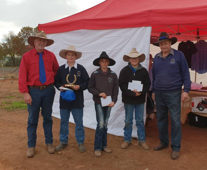 Junior plough winners Lachlan Rice, Gabrielle Dray and Joey Reedy with Chris Chapman and Australian Draught Horse Stud Book Society Western President Bob Gleeson.