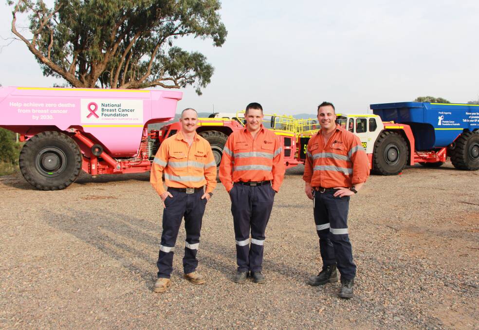 Mobile Fleet Maintenance manager Adrian Bush, Fleet Maintenance leading hand Stephen Roffe and Cadia East development mining superintendent David L'Estrange with the new tubs. Photo contributed.