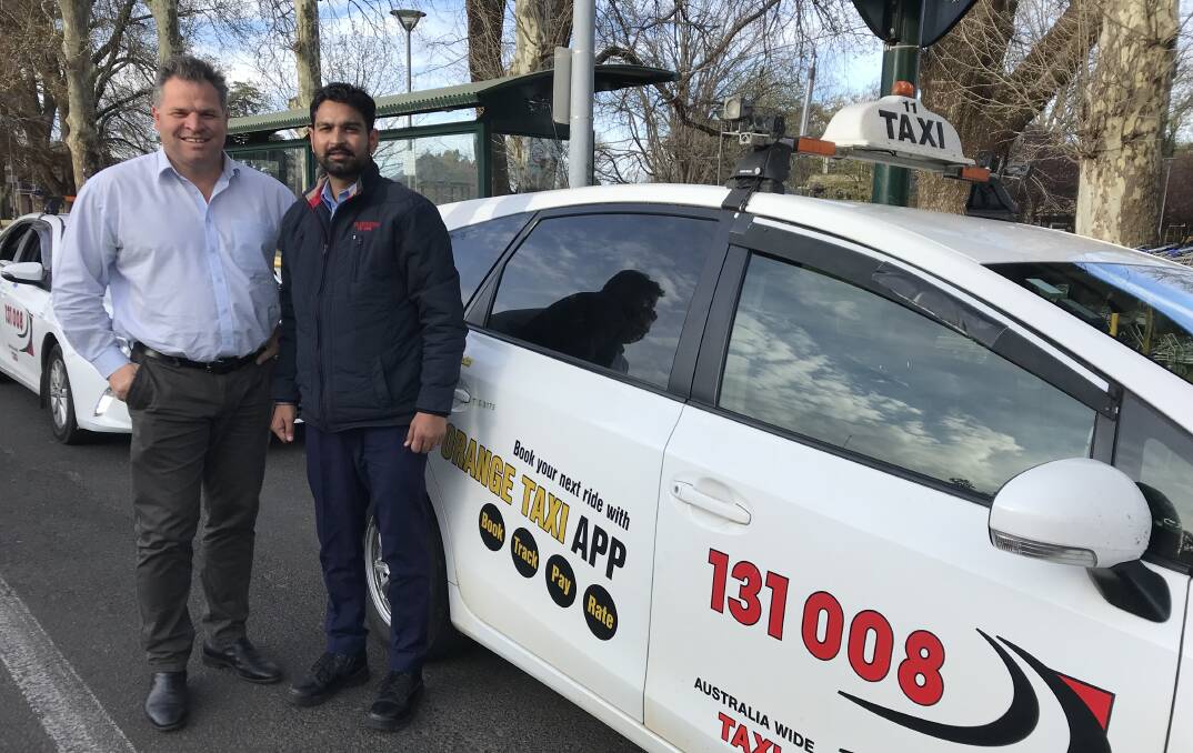 Phil Donato with taxi driver Manu Sharma.