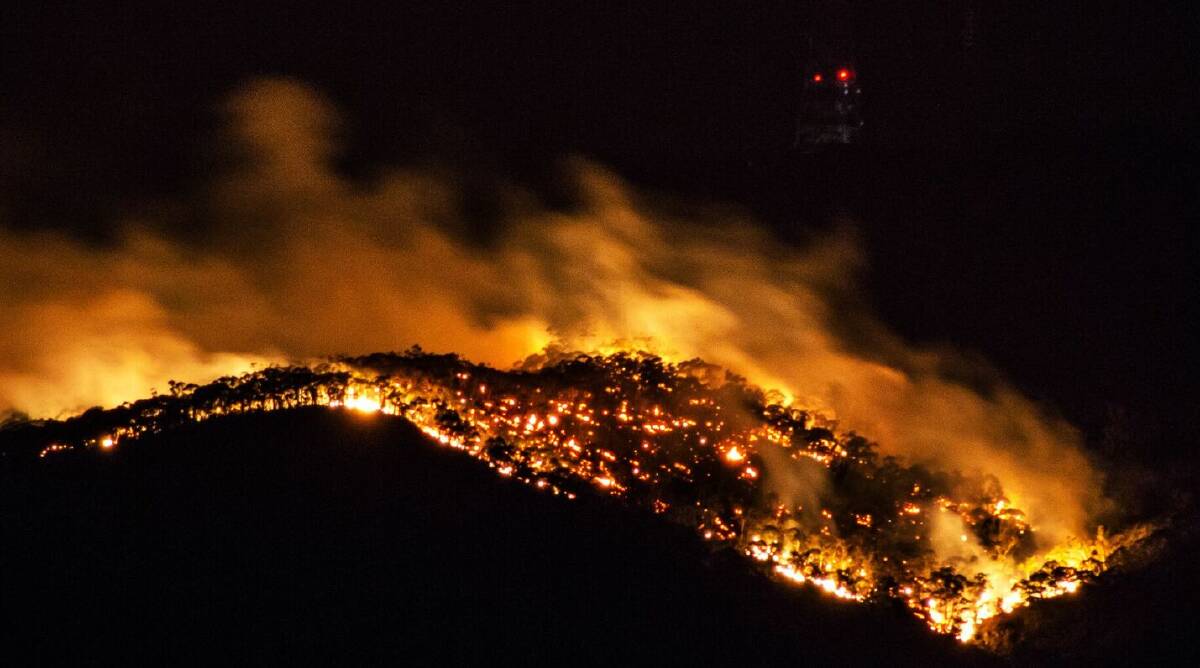The fire tore through bushland around Mount Canobolas on Saturday night and Sunday afternoon: Photo: TROY BARRETT