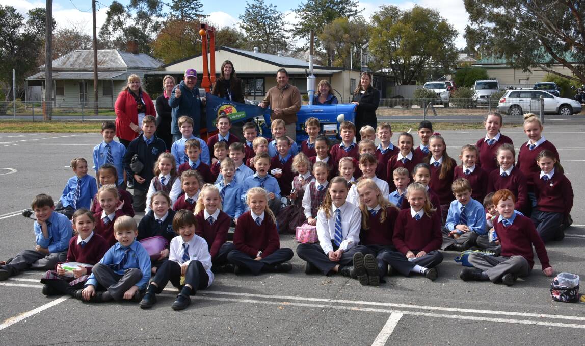 The students of St Edwards Catholic School with Roy White and the teachers who will be taking part in the 24-hour tractorthon.