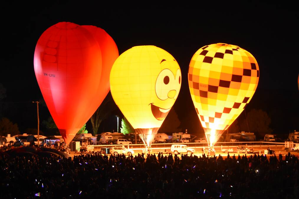 Feel the Glow: From balloons and burners to glow sticks and even smart phones, the dazzling display at the Canowindra International Balloon Challenge is one not to be missed. Photo: File.
