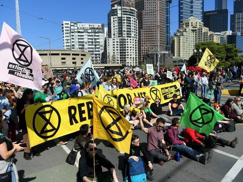 More than 300 climate protesters have blocked Princes Bridge in Melbourne.