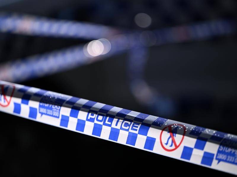 A critically injured woman found near a house fire north of Brisbane has died. (Joel Carrett/AAP PHOTOS)
