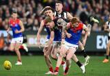 Melbourne's coaches have been drilling in the dangers of bumping as the AFL clamps down. (Joel Carrett/AAP PHOTOS)