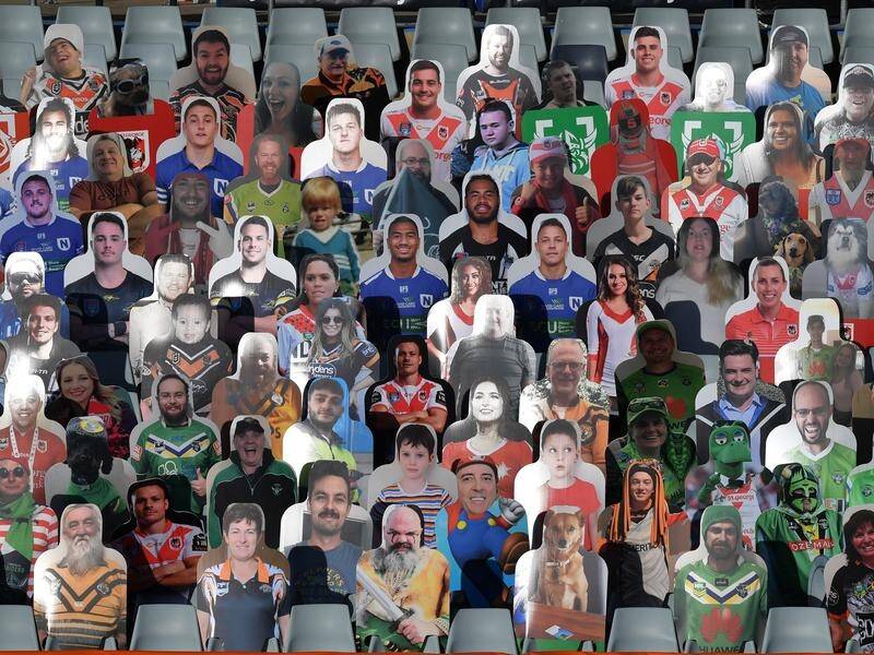 Cardboard cutouts of fans during an NRL round three match.