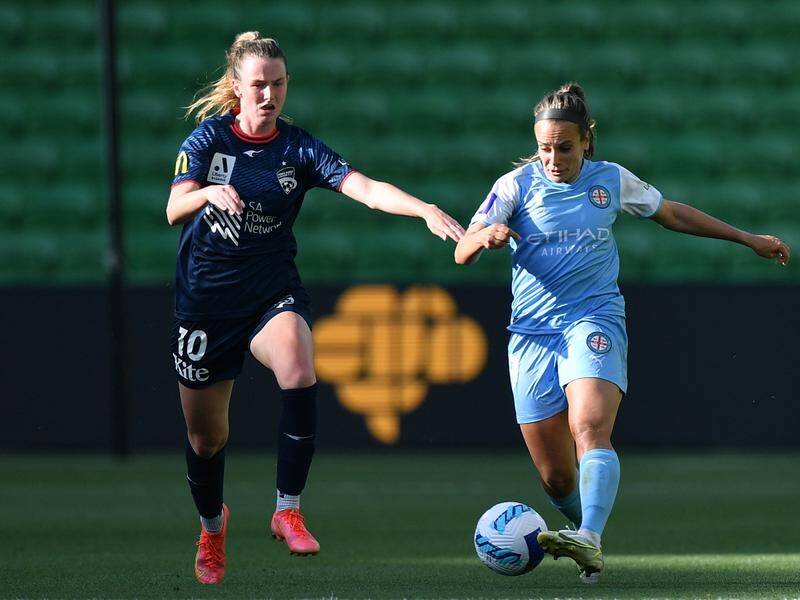 Adelaide's Chelsea Dawber (l) has scored three times as many goals as the WSW squad this season.