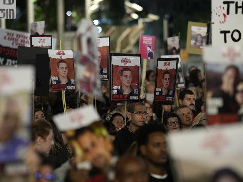 Thousands of Israelis have rallied in Tel Aviv to demand Hamas release all hostages. (AP PHOTO)