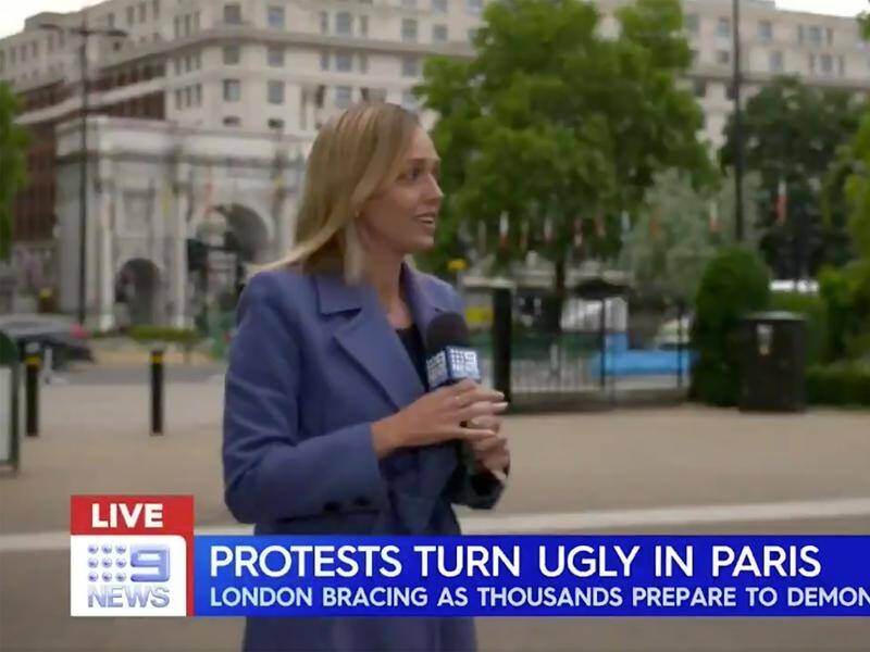 Two Nine News reporters covering a demonstration in central London have been assaulted.