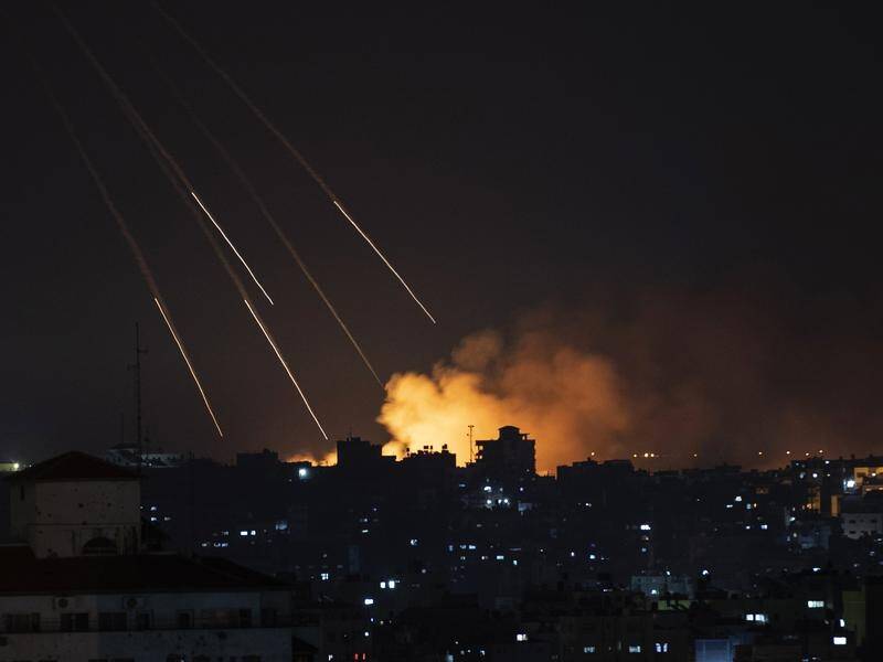 Israel's late-night moves sent Hamas fighters rushing into defensive positions in Gaza.