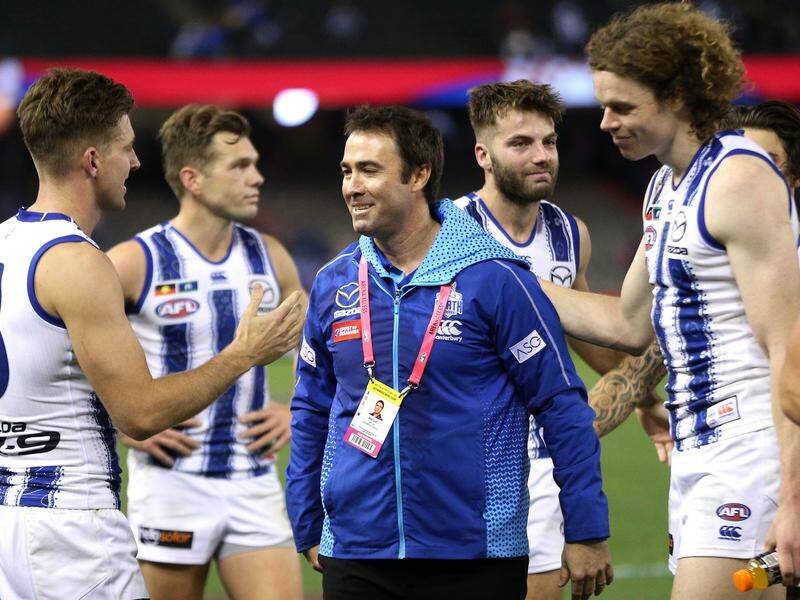 North Melbourne coach Brad Scott has farewelled his AFL side after 10 years at the helm.
