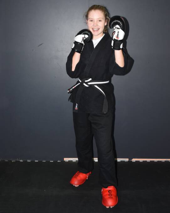 GETTING ACTIVE: Abby Breen, 11, is one of 20 children who have claimed an Active Kids voucher this year through Warren Hickey's Precision Martial Arts. Photo: NADINE MORTON